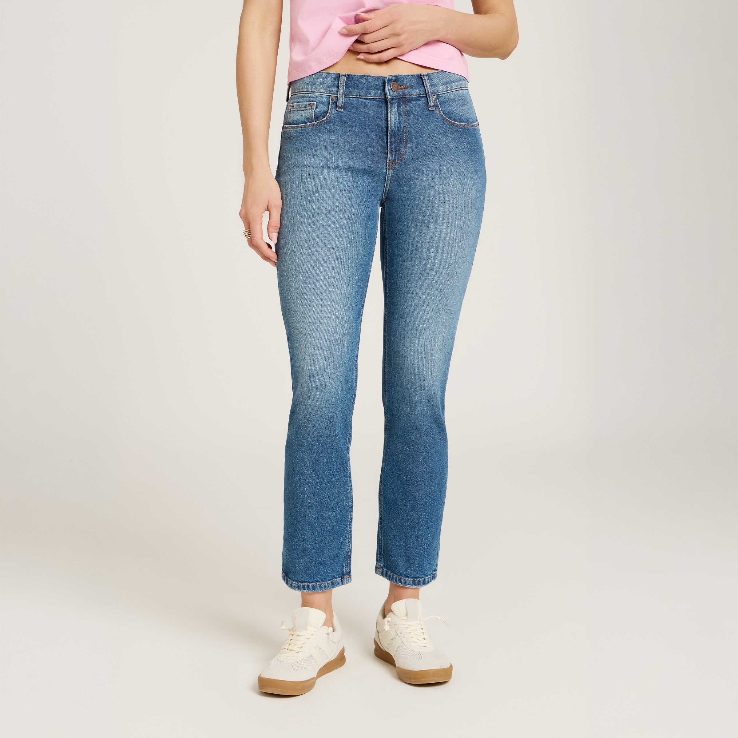 Women wearing Light Blue Mid Rise Slim Straight Ridge Jeans