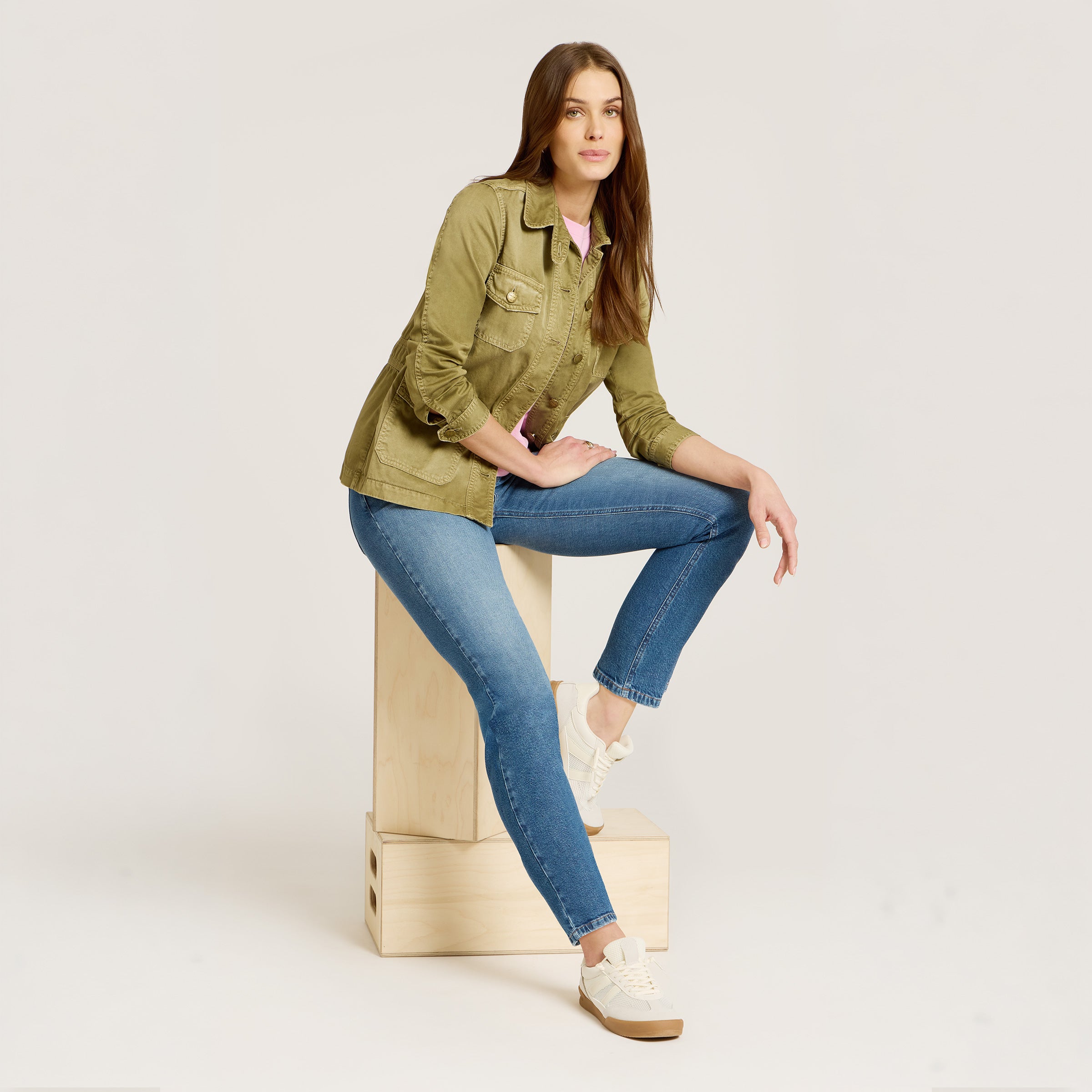 Women wearing Light Blue Mid Rise Slim Straight Ridge Jeans