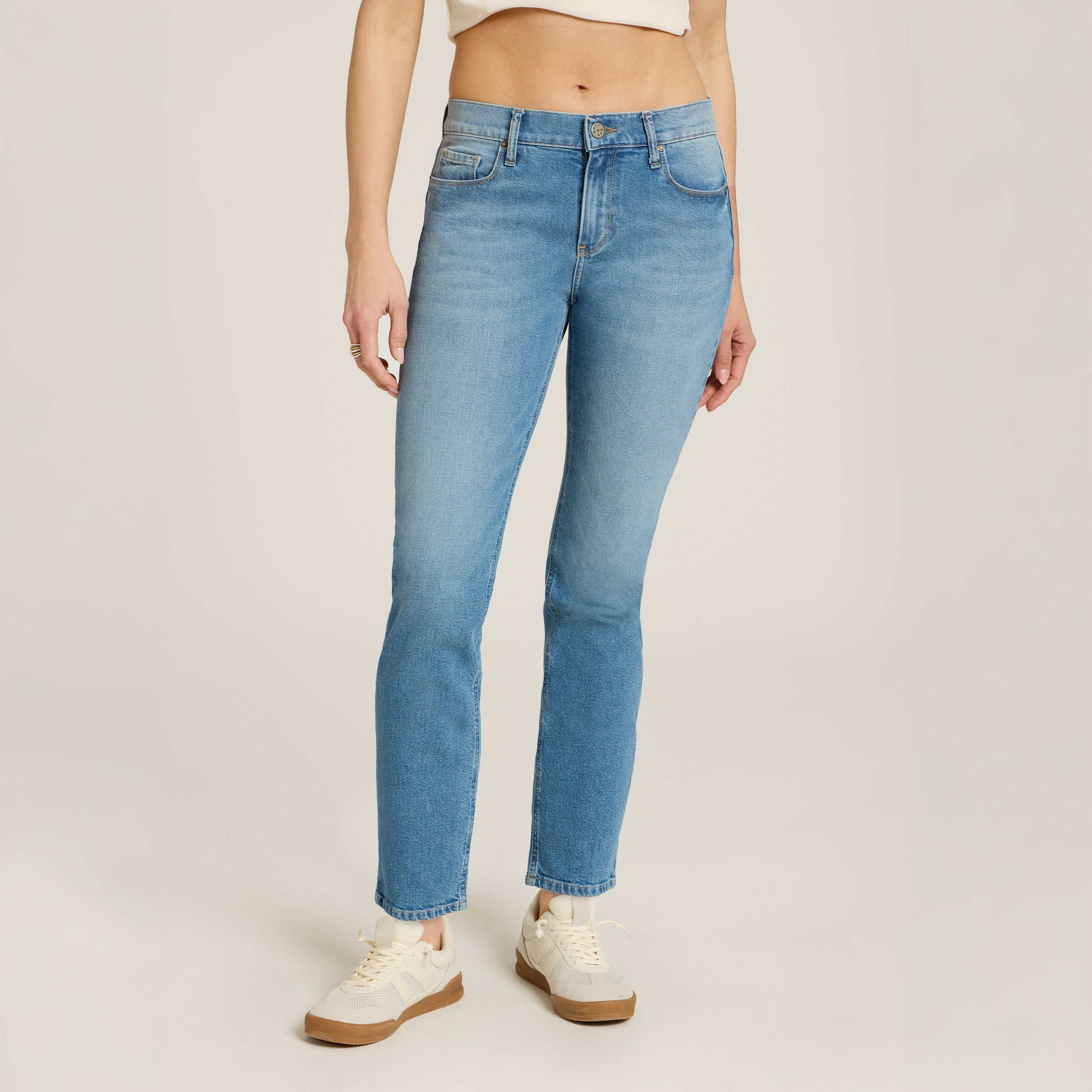 Women wearing Washed Out Blue Mid Rise Slim Straight Ridge Jeans