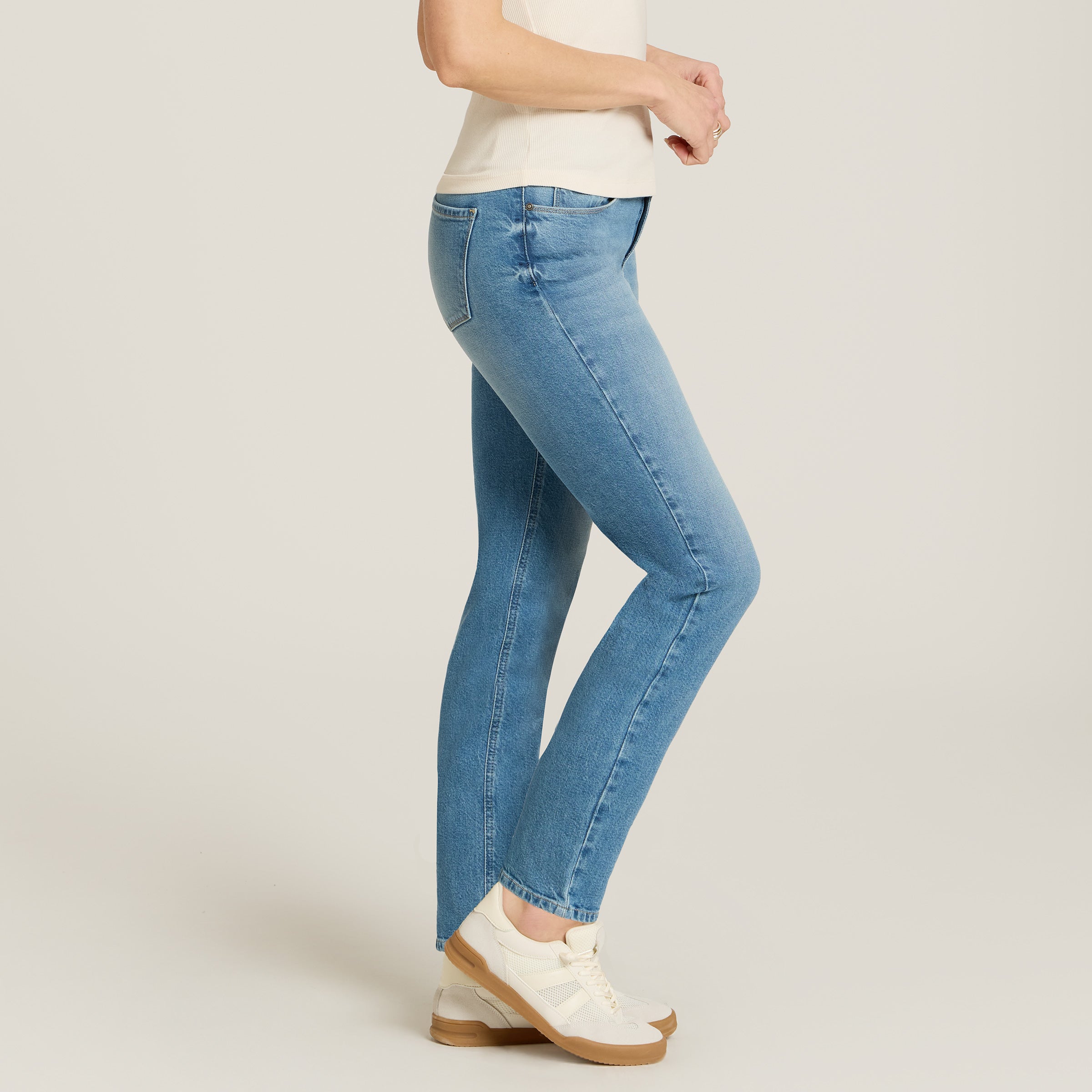 Women wearing Washed Out Blue Mid Rise Slim Straight Ridge Jeans