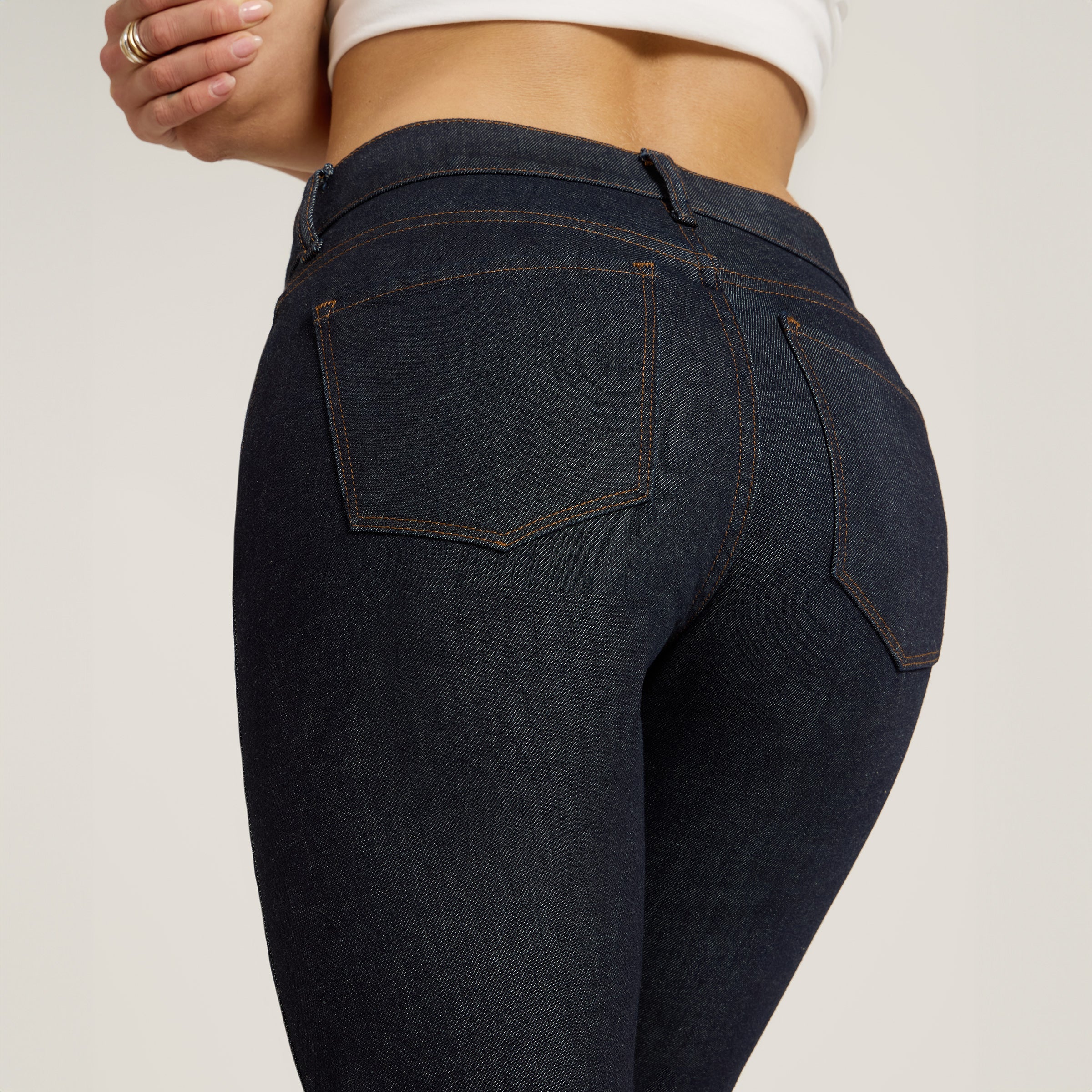 Women wearing Dark Blue Mid Rise Slim Straight Ridge Jeans