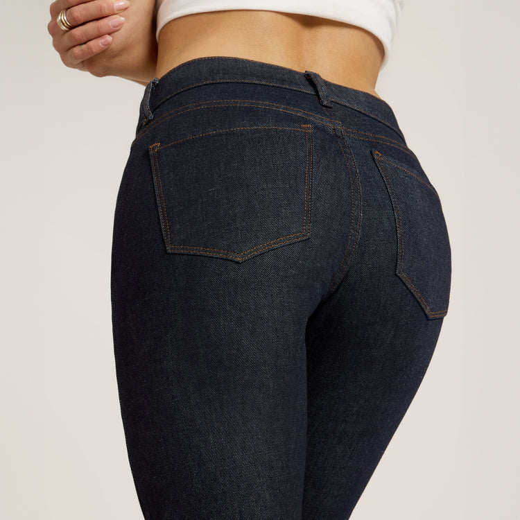 Women wearing Dark Blue Mid Rise Slim Straight Ridge Jeans