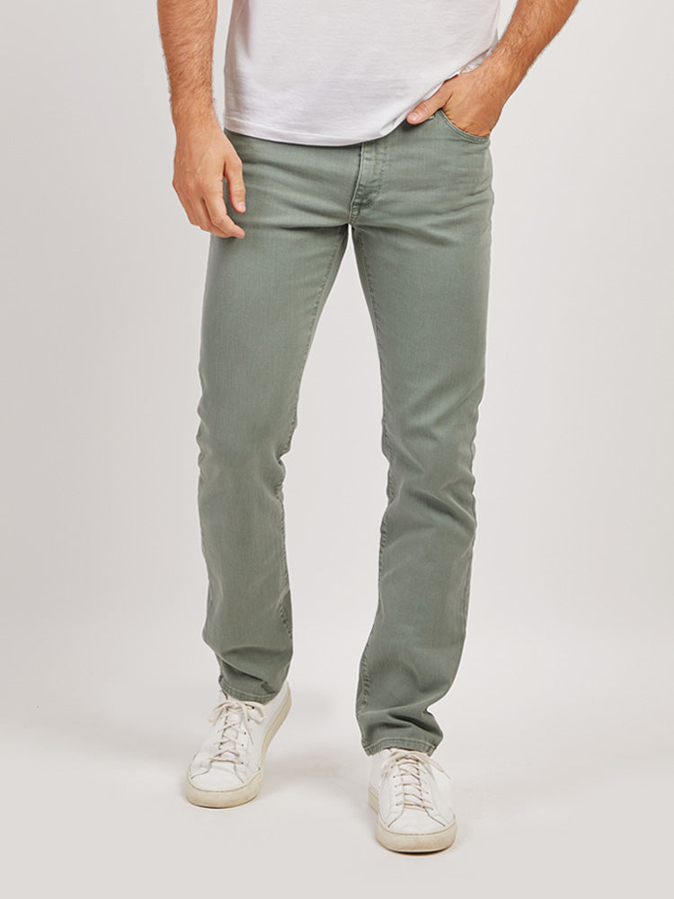  wearing Military Green Slim Mercer Jeans - Pre Order jeans