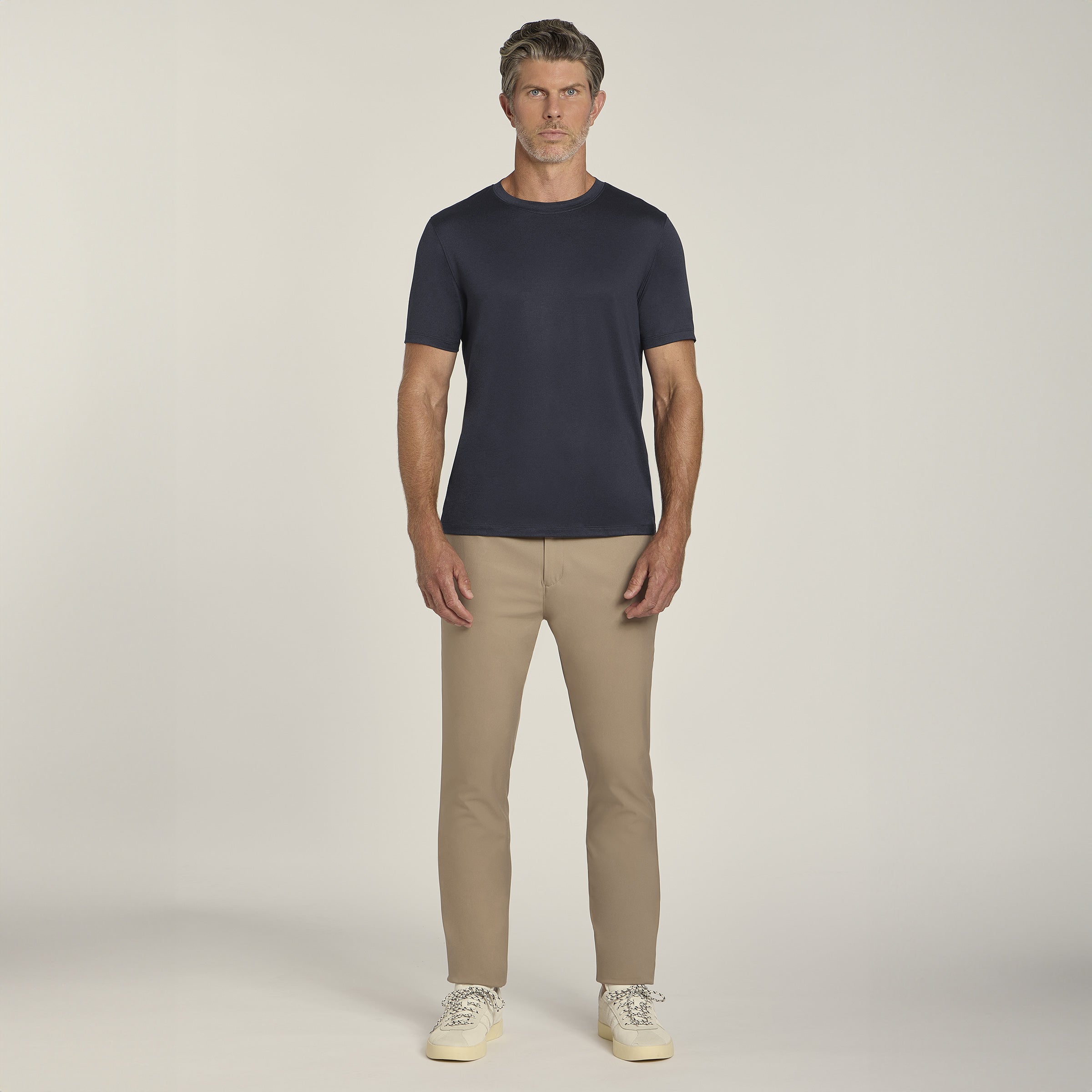 Men wearing Navy Heather Tech Tee