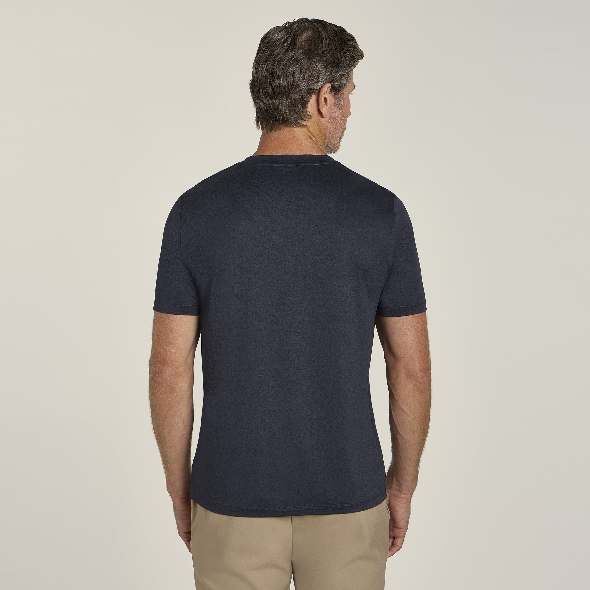 Men wearing Navy Heather Tech Tee