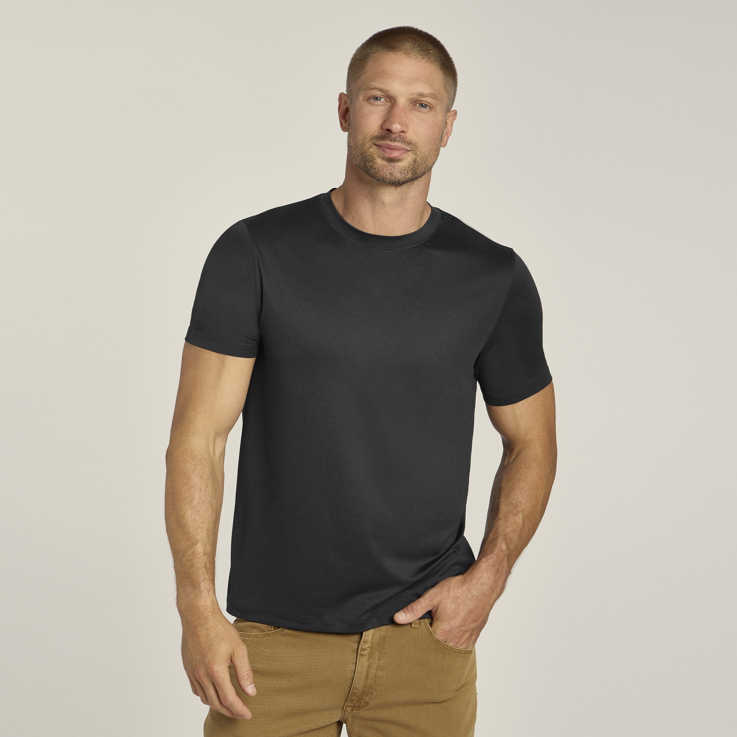 Men wearing Black Heather Tech Tee