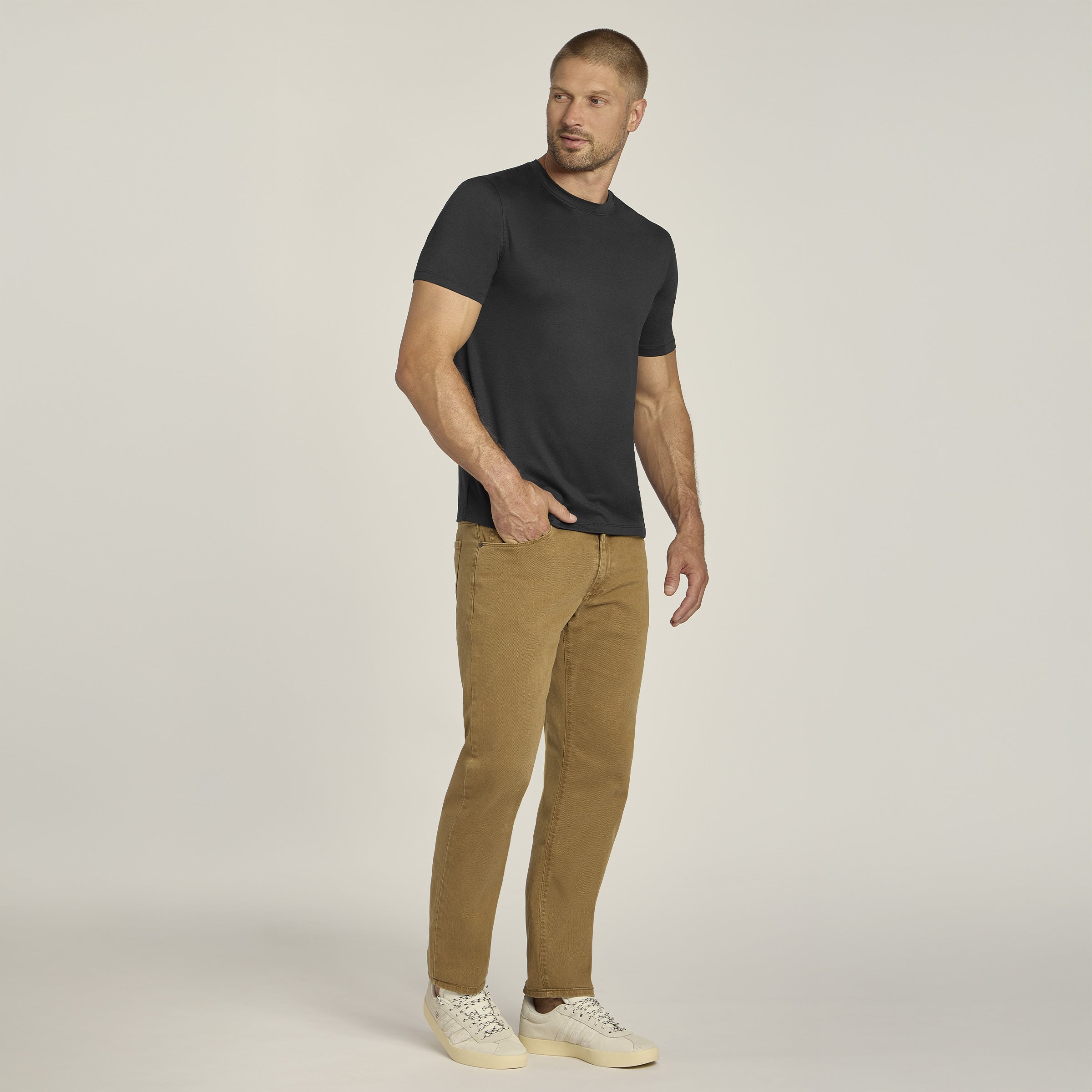 Men wearing Black Heather Tech Tee