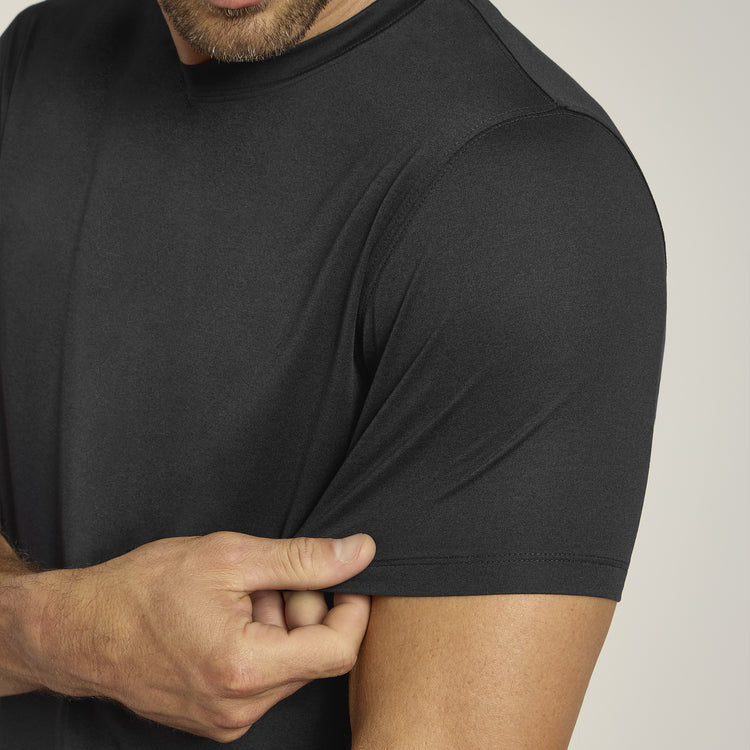 Men wearing Black Heather Tech Tee