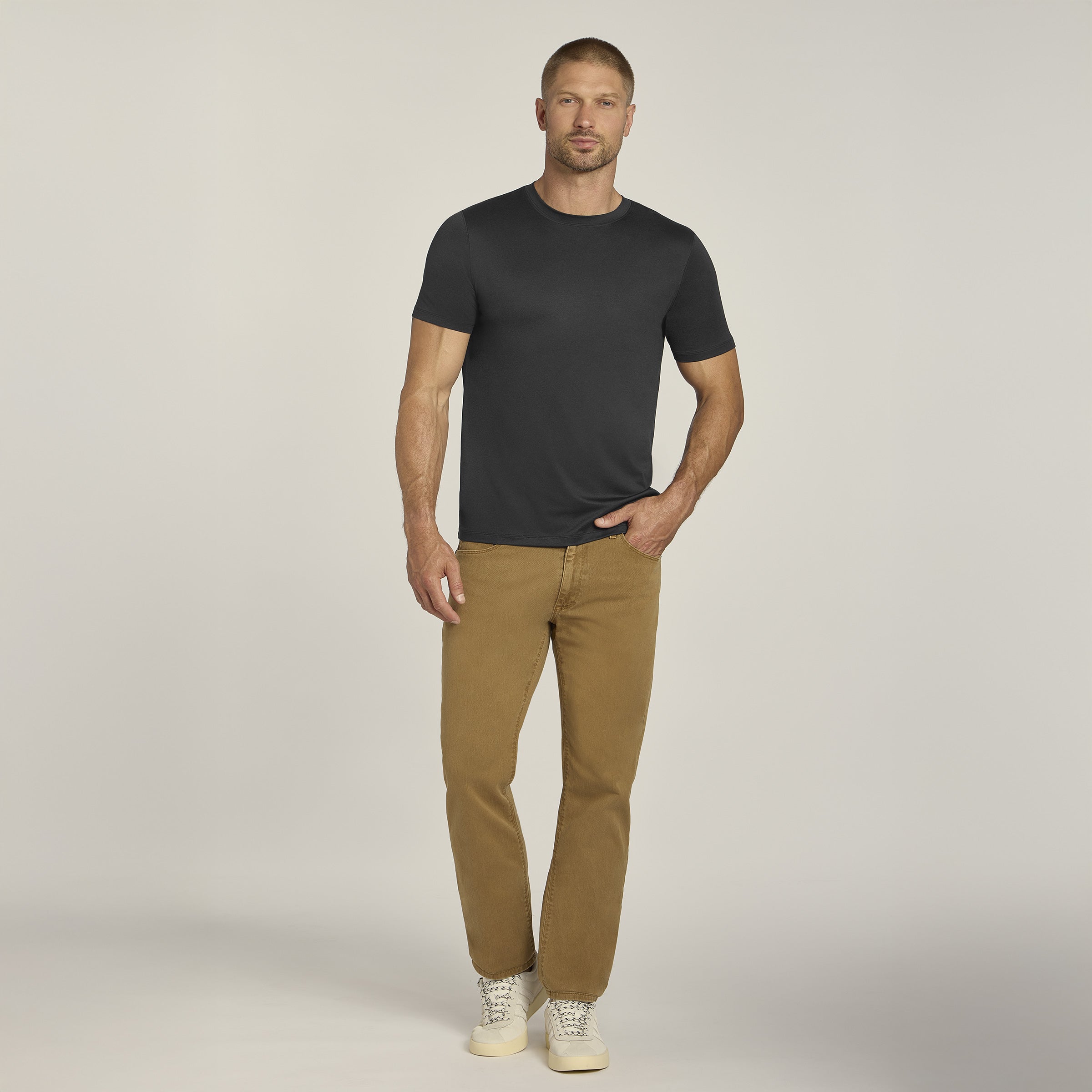 Men wearing Black Heather Tech Tee