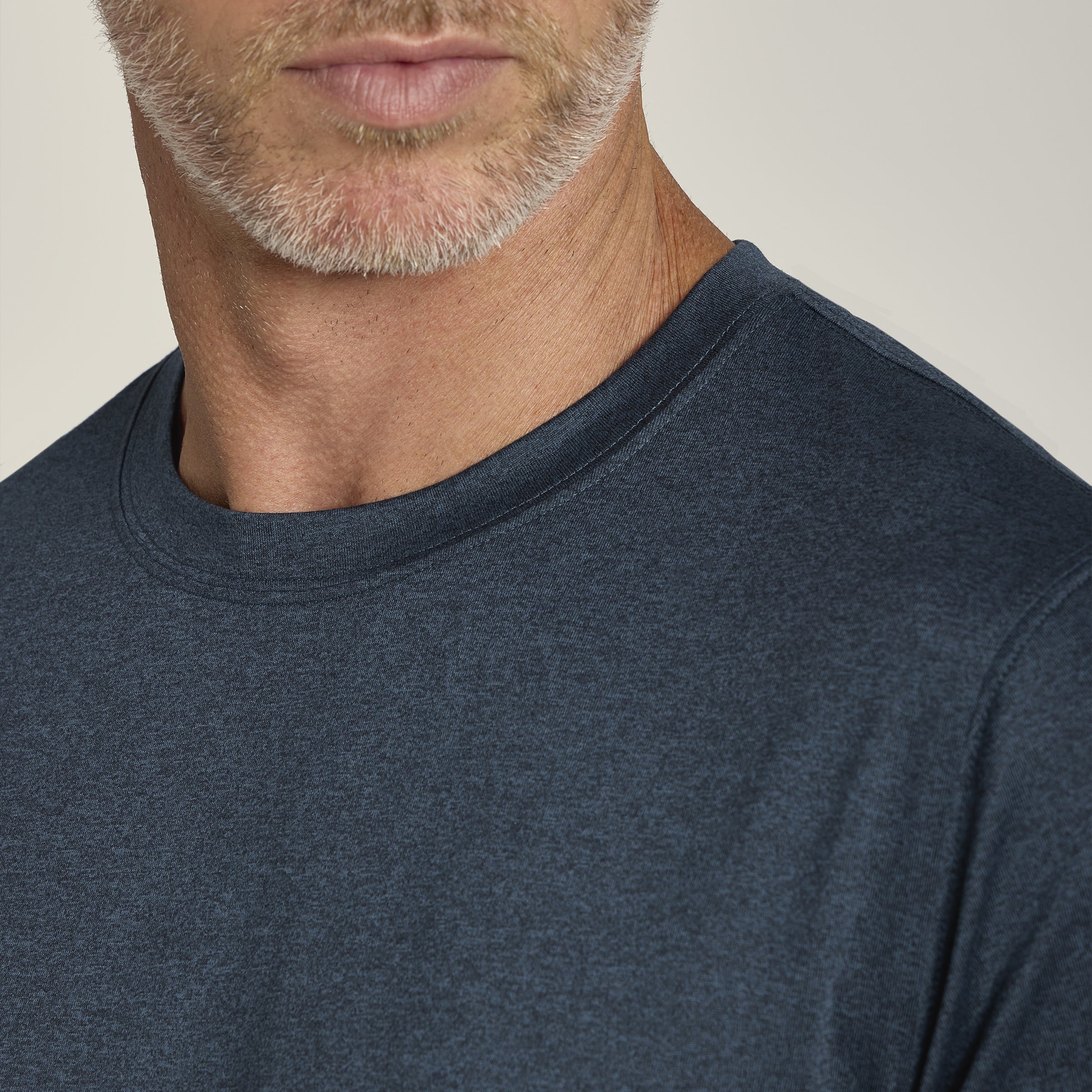 Men wearing Teal Heather Tech Tee