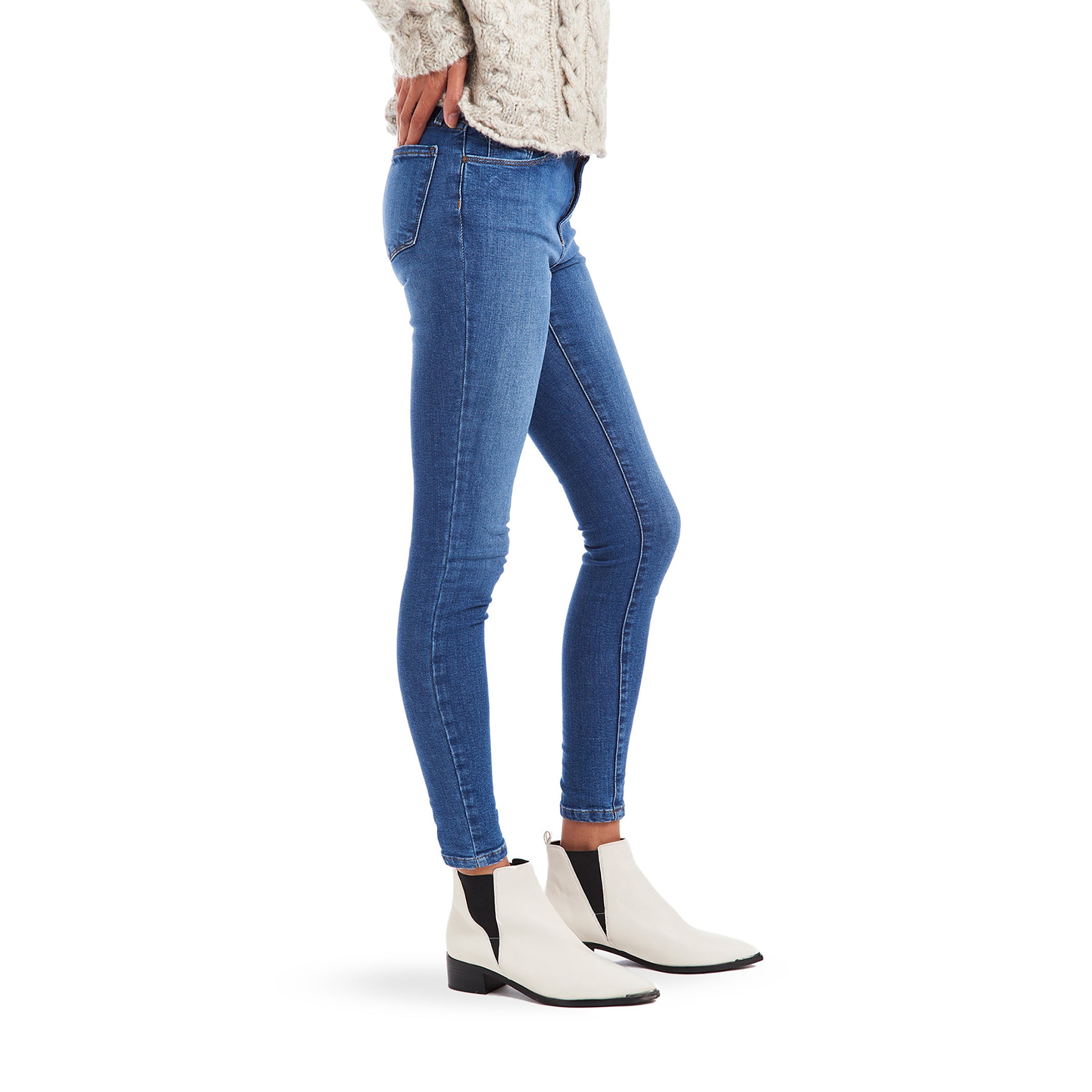 Women wearing Light/Medium Blue High Rise Skinny Beekman Jeans