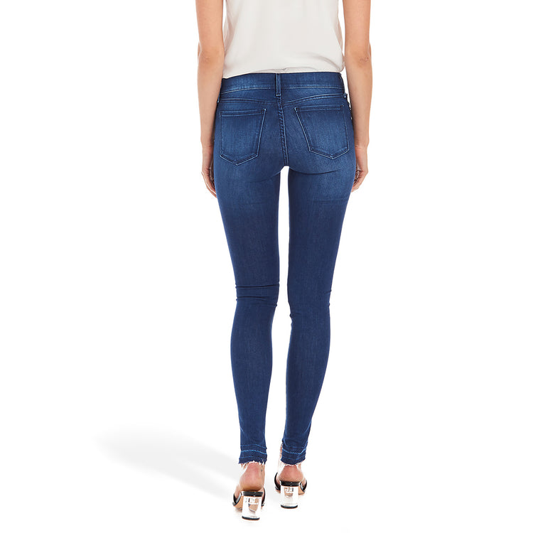 Women wearing Medium Blue w/ Back Hem Mid Rise Skinny Carmine Jeans