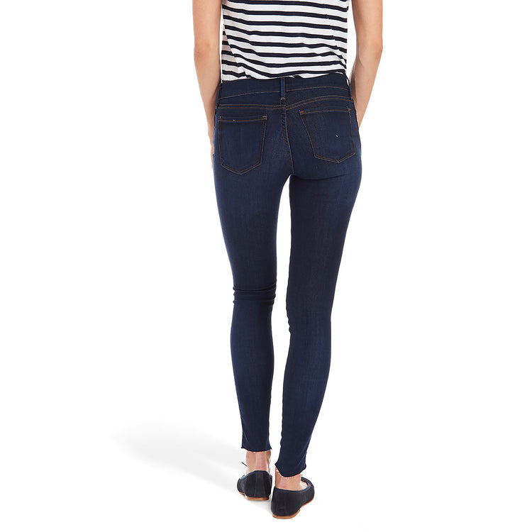 Women wearing Faded Medium/Dark Blue w/ Raw Hem Mid Rise Skinny Jane Jeans