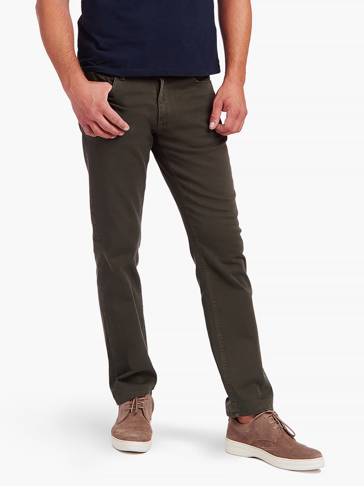  wearing Military Green Slim Mercer Jeans - Pre Order jeans